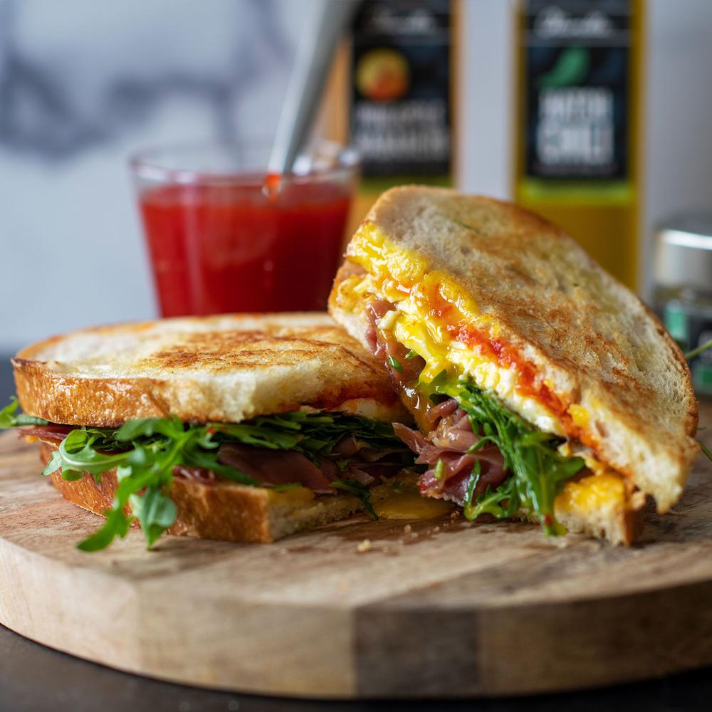 Fried Egg, Prosciutto, and Red Pepper Jam Breakfast Sandwich