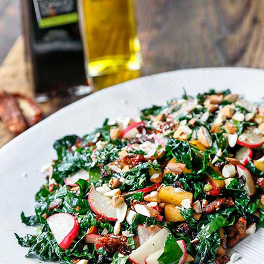 Warm Bacon and Kale Salad with Sun Dried Tomato Vinaigrette